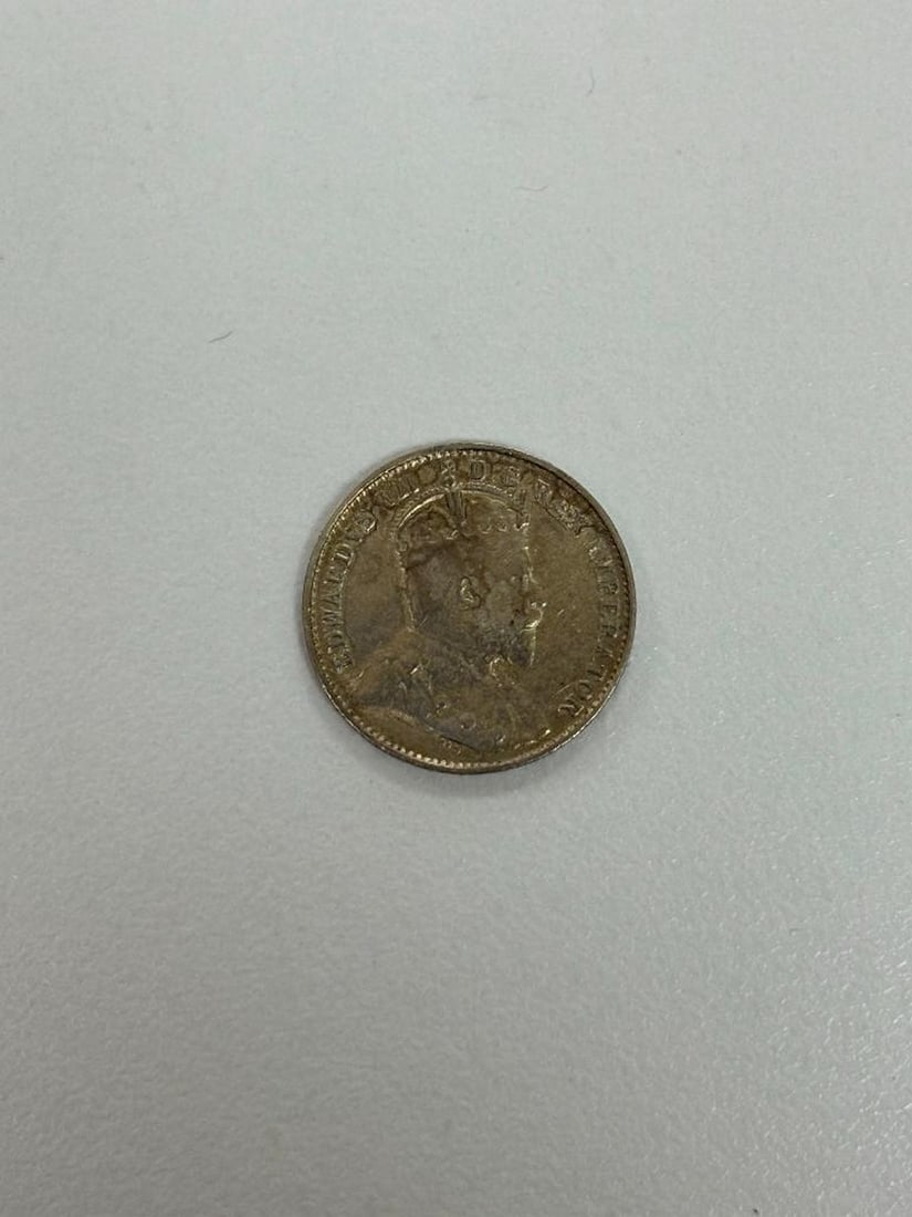 1902 Canadian 5 Cent Coin: 1902 Canadian 5 Cent Coin Legend (lettering): Obverse: EDWARDVS VII D.G.REX IMPERATOR Reverse: 5 CENTS CANADA 1902 Design(s): Obverse: Bust of king Edward VII wearing a crown. Reverse: Crown o