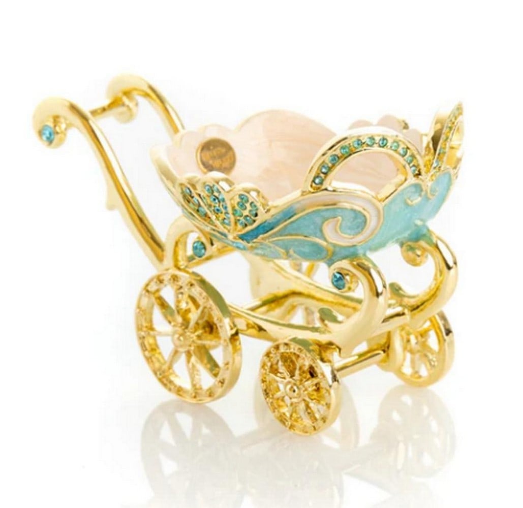 Vintage Turquoise Baby Carriage Stroller Trinket Box: Vintage Turquoise Baby Carriage Stroller Trinket Box This exquisite Vintage Turquoise Baby Carriage Stroller Trinket Box is a charming keepsake. Painted by hand using a unique procedure that combines 