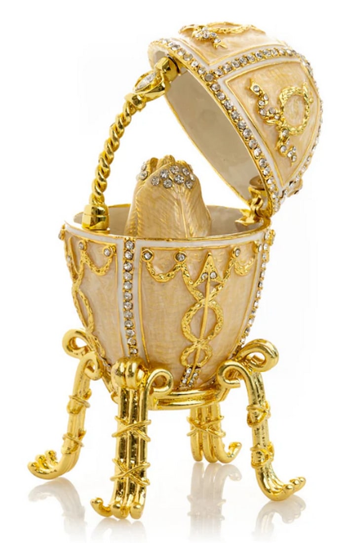 Surprise Tulip Flower Inside Gold Egg: Surprise Tulip Flower Inside Gold Egg This lovely handmade piece is a unique one-of-a-kind creation designed for art lovers inspired by beauty. Plated with 24K gold, each handpicked crystal is