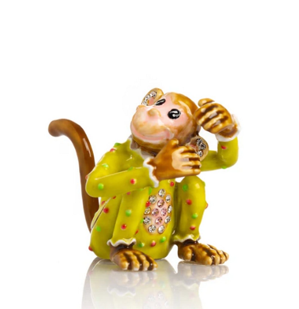 Circus Monkey Trinket Box: Circus Monkey Trinket Box This enamel-painted trinket box is beautifully decorated with handpicked Austrian crystals, each artistically placed to create a stunning design. Plated with either 24K gold 