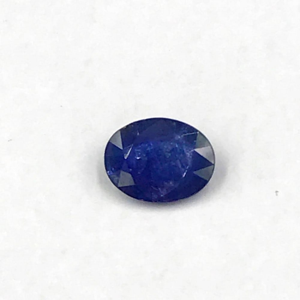 Dark Blue Faceted Sapphire Oval: Dark Blue Faceted Sapphire Oval Sapphire is a gemstone associated with royalty. It is believed to attract abundance, blessings, and gifts. It has been used to protect against negative energies, as wel