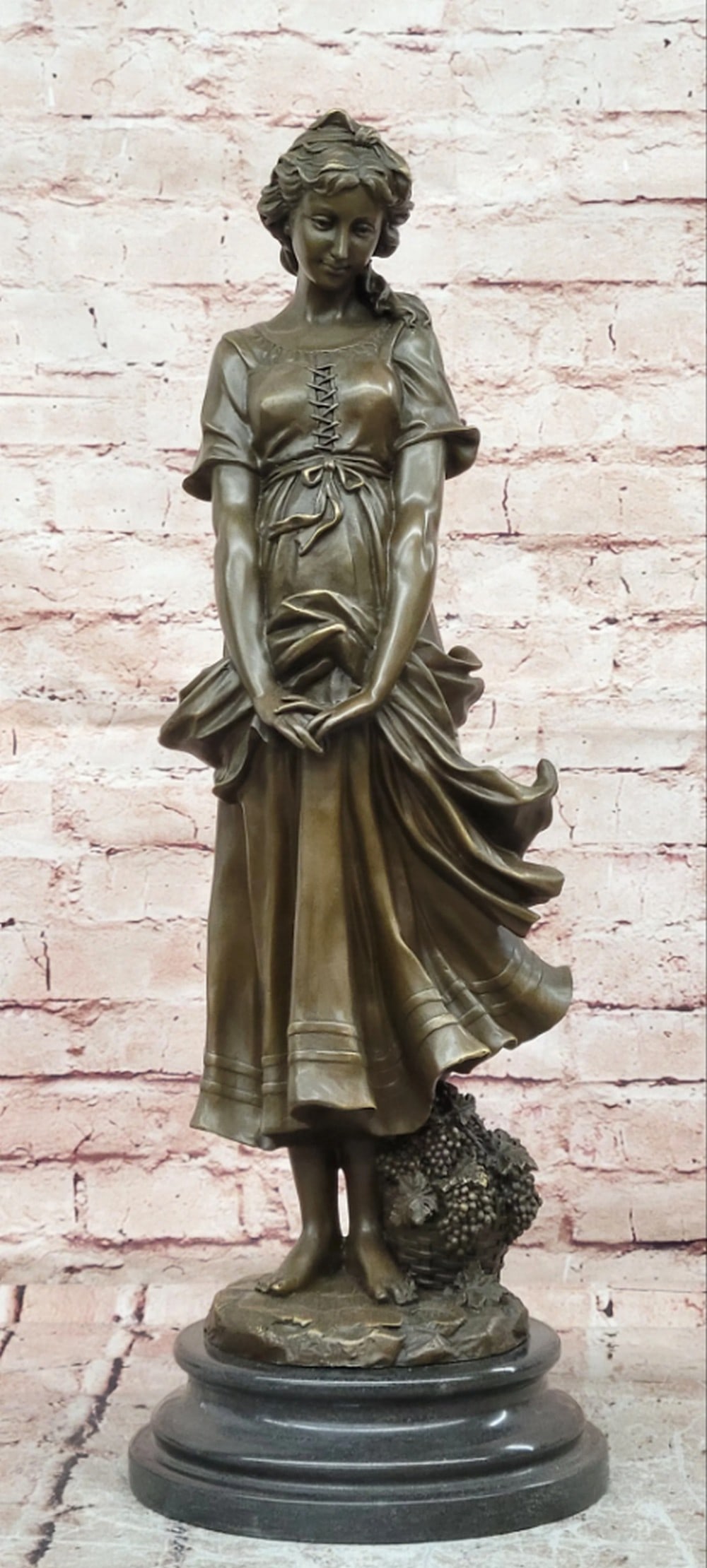 Bronze Sculpture of Woman Harvesting Grapes on Marble Base - 22'' x 7.5'': Bronze Sculpture of Woman Harvesting Grapes on Marble Base - 22" x 7.5" Introducing a Bronze Sculpture: This composition depicts a classical woman harvesting grapes, representing abundance, fert