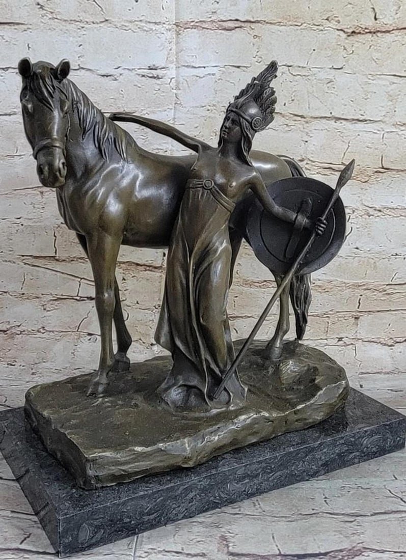 Mythological Greek Hippolyta Queen of the Amazonian Bronze Sculpture: Mythological Greek Hippolyta Queen of the Amazonian Bronze Sculpture This gorgeous Amazon woman stands next to her faithful horse in the midst of her lovely town. She is wearing the most adorable most
