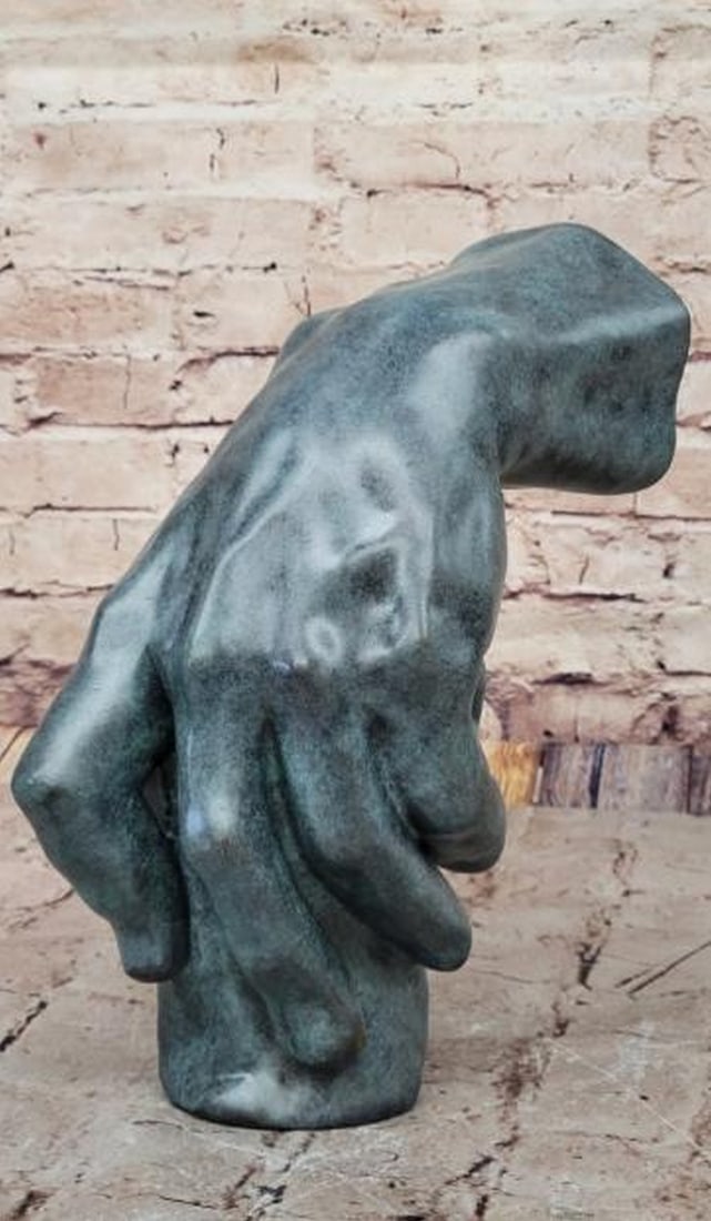 Anatomy in Art: The Sculpted Hand Bronze Sculpture: Anatomy in Art: The Sculpted Hand Bronze Sculpture. Inspired by sculptor Rodin and bearing the signature of artist Milo, this bronze sculpture masterfully captures the intricate details of the human h