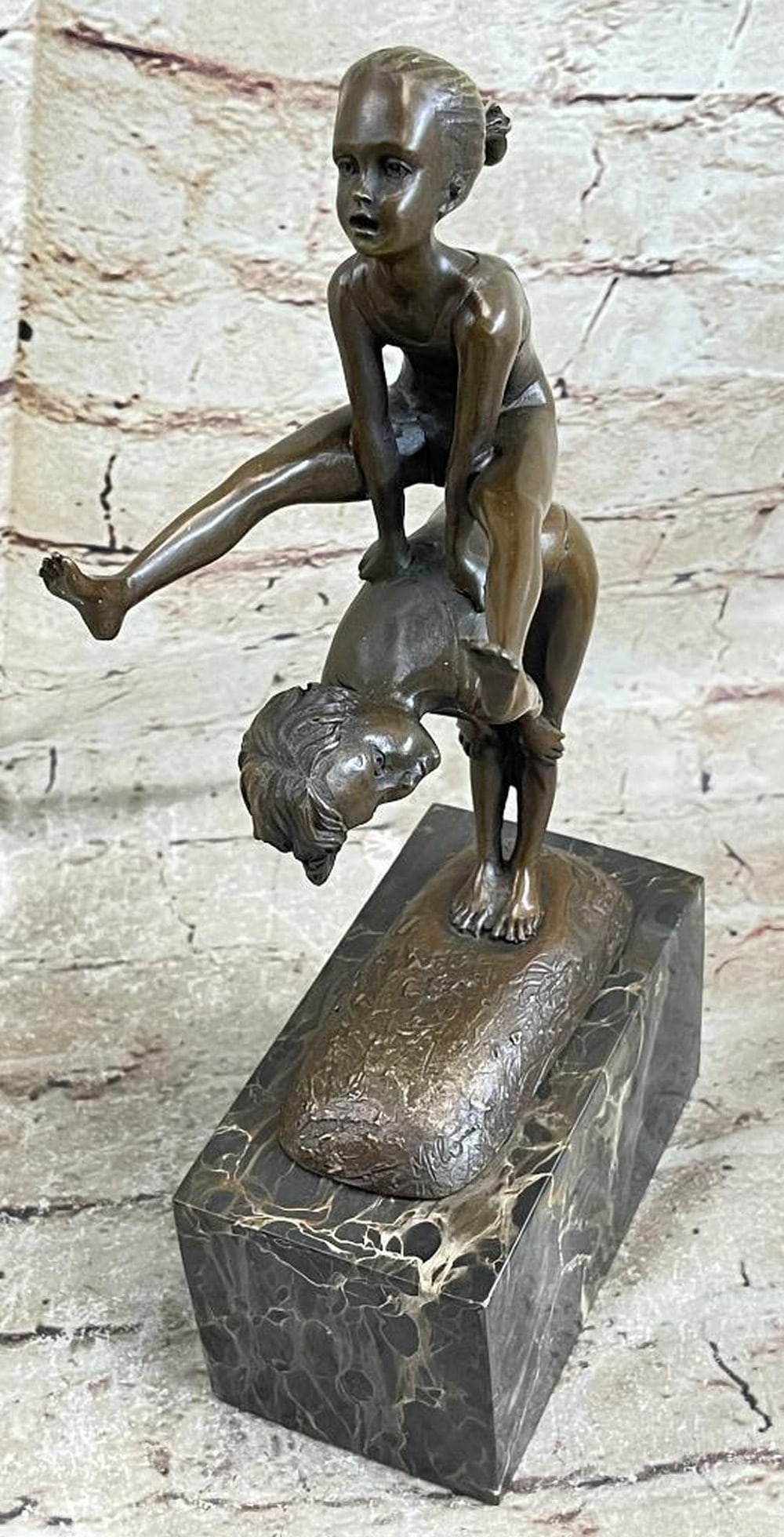 Siblings at Play Heartwarming Original Bronze Sculpture by Milo - 11'' x 5'': Siblings at Play Heartwarming Original Bronze Sculpture by Milo - 11" x 5" This enchanting bronze sculpture beautifully captures a timeless moment of childhood joy and camaraderie. Two young sib