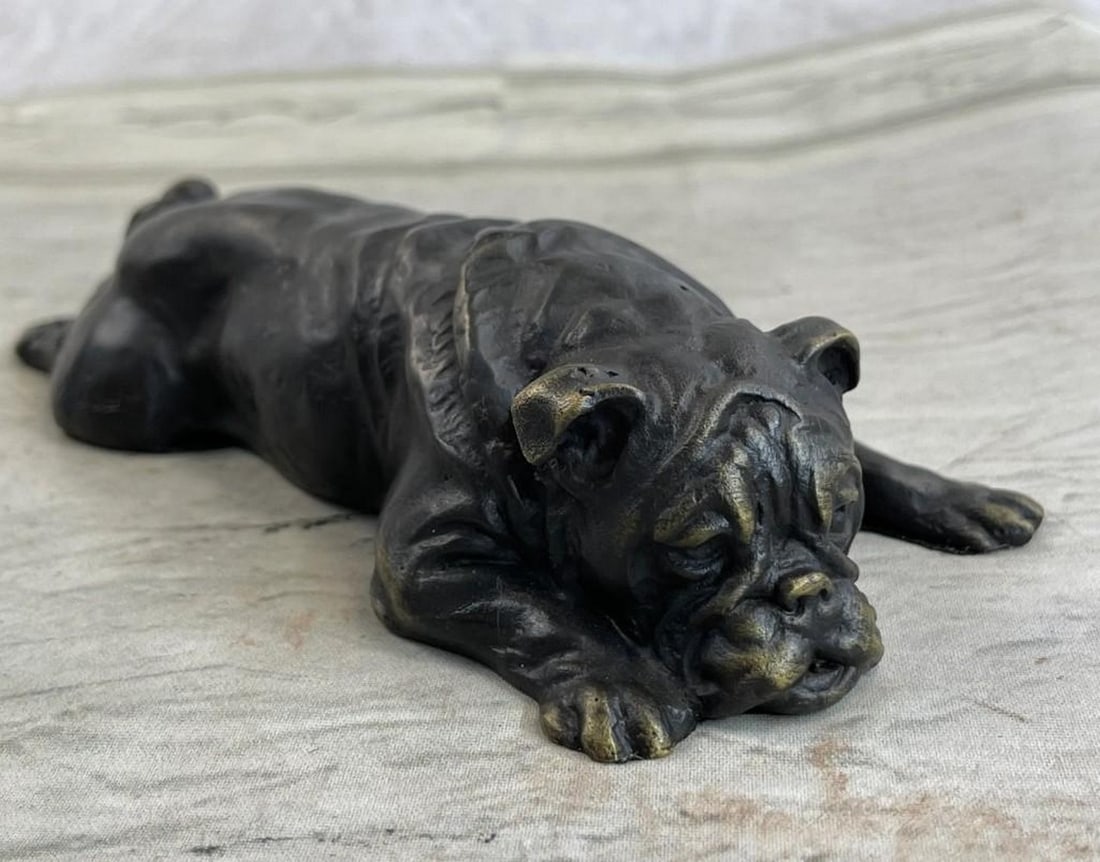 Sweet Bulldog Puppy Bronze Sculpture: Sweet Bulldog Puppy Bronze Sculpture This adorable bronze sculpture shows the sweetest little bulldog lying on his belly sprawled out on the marble. With the cutest and very lifelike facial features t
