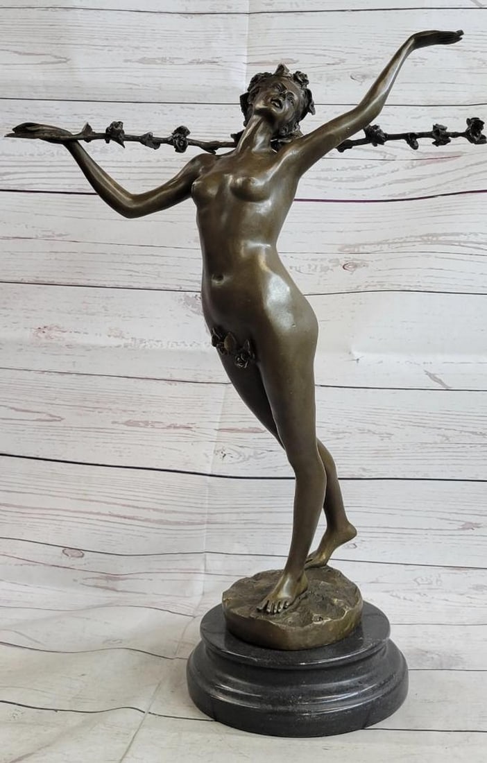 Signed Original Vitaleh Nude Nymph Calling into Forest Bronze Sculpture - 15lbs: Calling out into the forest the wood nymph raises her arm and looks out onto the land. The flowers that cover her pelvis are the only covering her body has. Her feminine and curves remain nude. Blosso