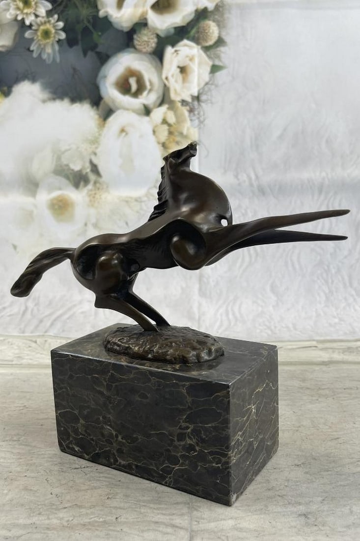 Abstract Modern Art Horse Bronze Sculpture: Abstract Modern Art Horse Bronze Sculpture This abstract and modern horse gallops into the wind and rears up letting out a wild neigh as the wind seems pushing against him with a mighty force. This ab