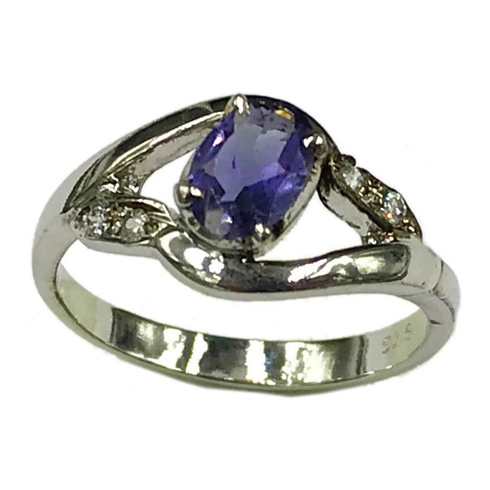 Sterling Silver Amethyst Stone Ring: Sterling Silver Amethyst Stone Ring This ring is studded with zirconias and a beautiful amethyst gemstone. Inner Diameter: 17.75mm View Photos For Further Details