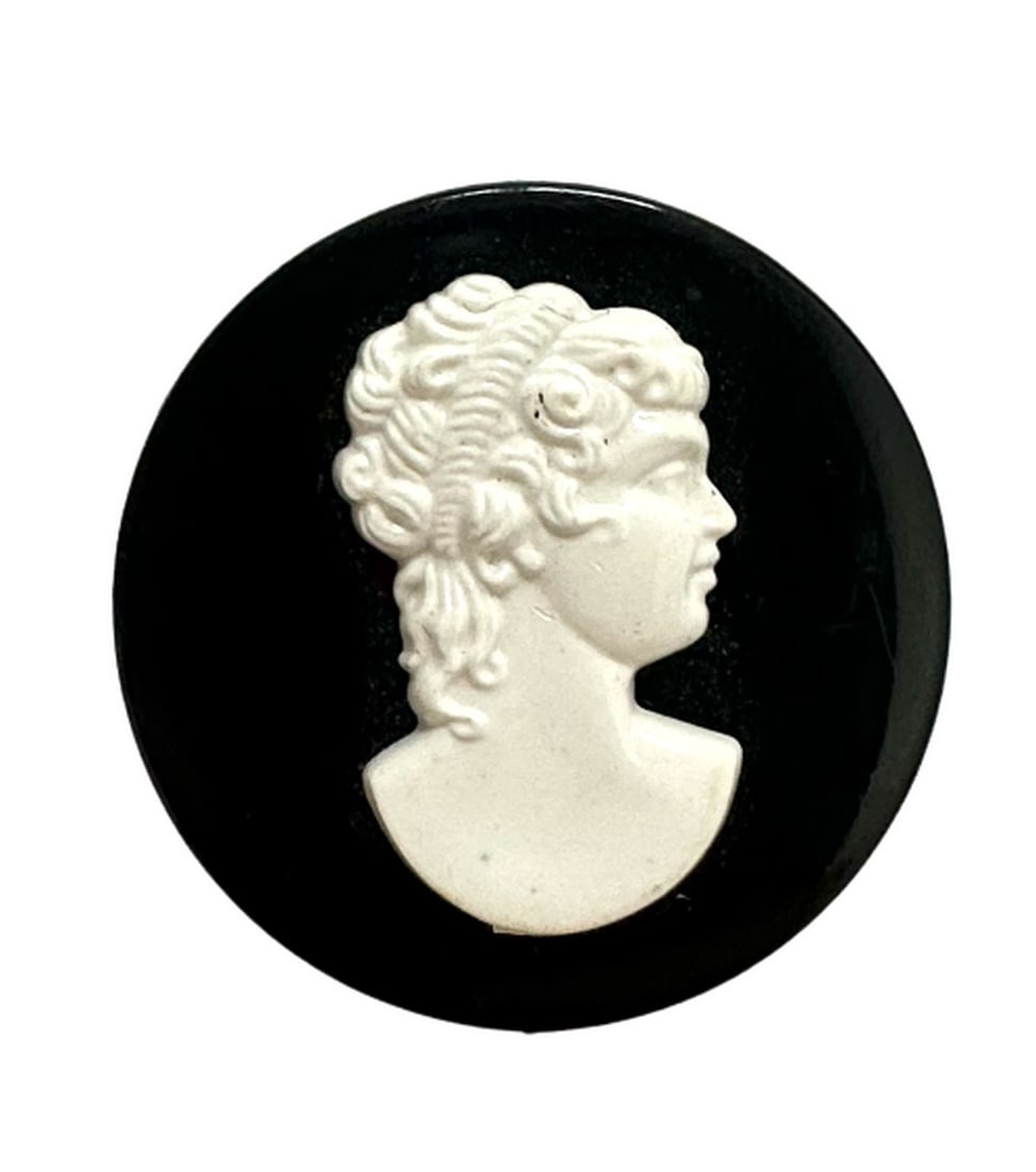 Black and White Cameo Panel Brooch Depicting A Silhouette Of A Victorian Beauty: Black and White Cameo Panel Brooch Depicting A Silhouette Of A Victorian Beauty The most popular cameos today are carved in sea shells, a tradition that began in the fifteenth or sixteenth century and