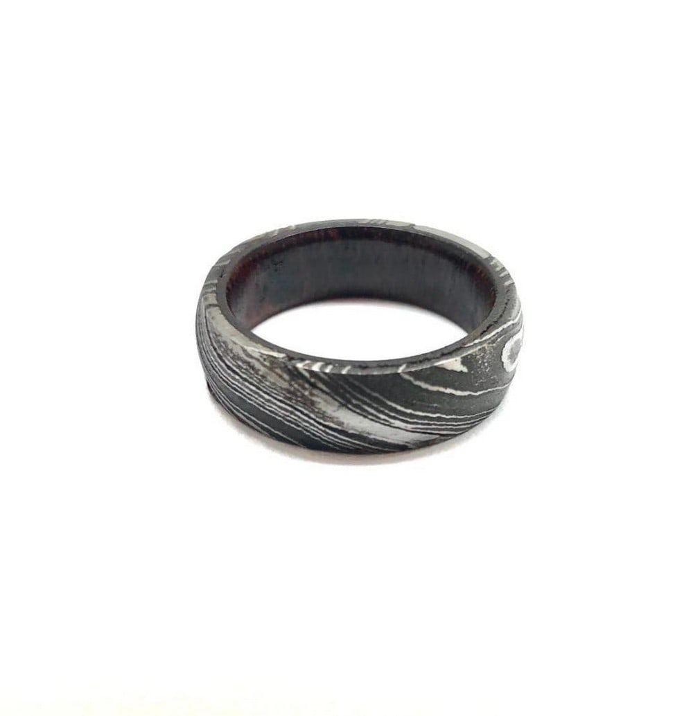 Men's Damascus Steel Ring With Whisky Barrel Inner Custom Sleeve: Men s Damascus Steel Ring With Whisky Barrel Inner Custom Sleeve. Size 10. View Photos For More Details.