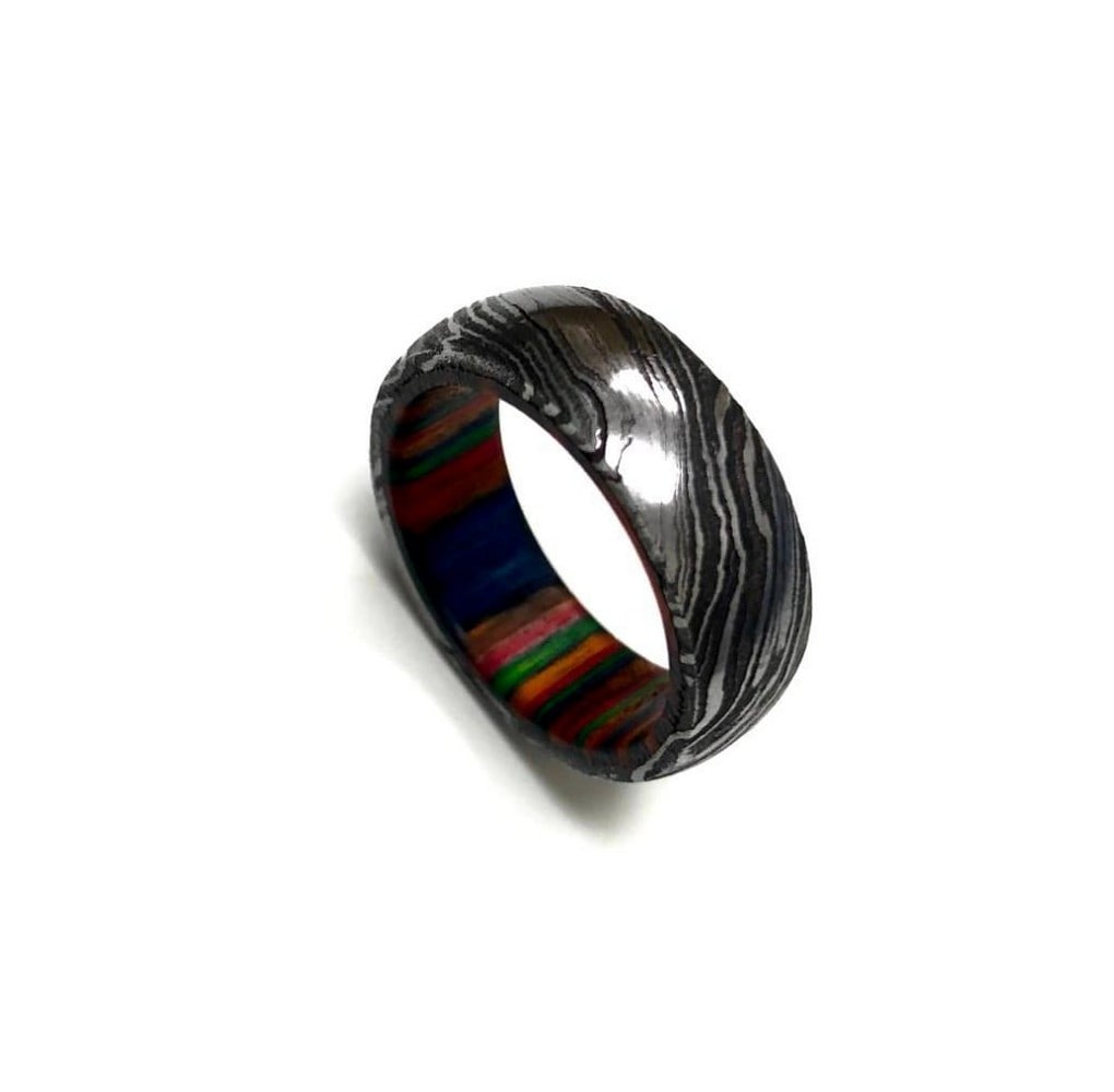 Men's Hand-Made Damascus Steel Ring With Multi-Coloured: Men's Hand-Made Damascus Steel Ring With Multi-Coloured Wood lining. Size 10, View Photos For More Details. 