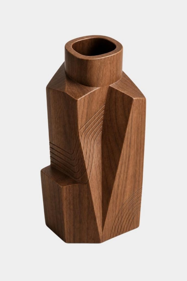 Architectural Facets' - Sculptural Wooden Vase: 'Architectural Facets' - Sculptural Wooden Vase A striking sculptural piece defined by bold geometric lines and angular facets, this wooden vase showcases a modern architectural silhouette with beauti