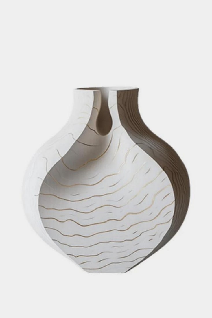 Inner Fold' - Contemporary Wooden Vase: 'Inner Fold' - Contemporary Wooden Vase A sculptural study in depth and contrast, this vase features a rounded form with a layered cutaway design that reveals its inner contours. The outer surface is 