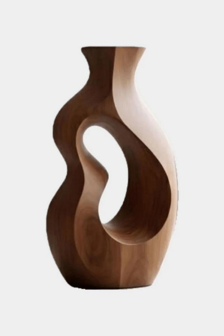 Dual Grain Flow' - Contemporary Wooden Sculptural Vase: 'Dual Grain Flow' - Contemporary Wooden Sculptural Vase An elegant sculptural form defined by movement and contrast, this vase features a flowing curved silhouette with an open carved center that crea