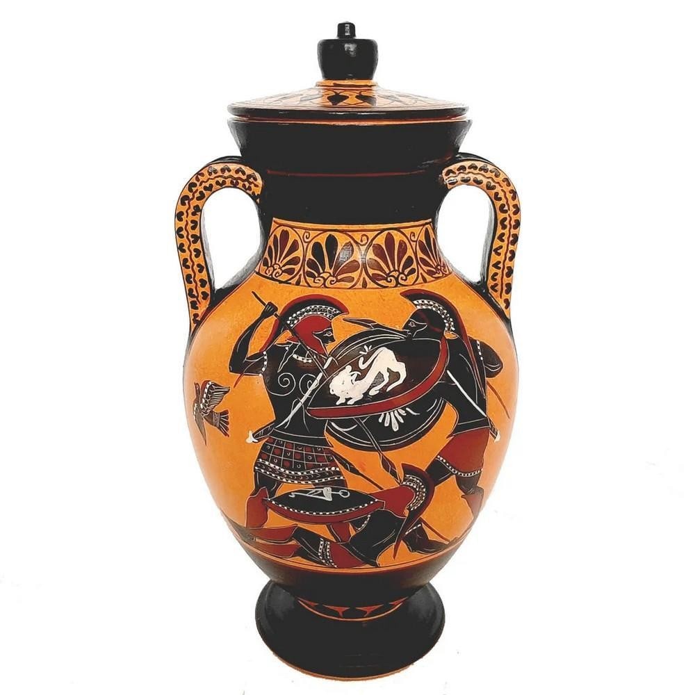 Black Figure Pottery Amphora with Lid - Iliad Battle Scene over Patroclus Replica: Black Figure Pottery Amphora with Lid - Iliad Battle Scene over Patroclus Replica Enhance your decor with an Ancient Greek Amphora reproduction with lid, painted in the Black Figure style. This amphor
