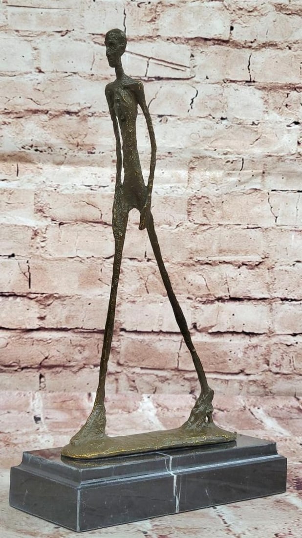 Abstract Walking Man Bronze Sculpture on Marble Base - 12.5" x 7.5": Abstract Walking Man Bronze Sculpture on Marble Base - 12.5" x 7.5" Elegant in form and rich in symbolism, this Abstract Walking Man bronze sculpture captures the fluid motion of the human fig