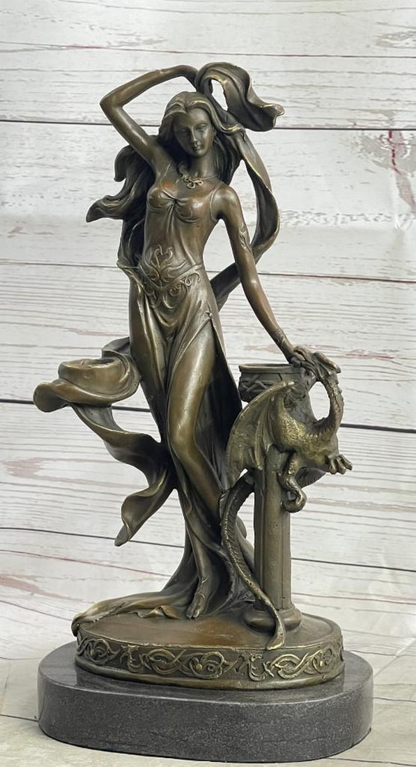 Fantasy Female Figure Dragon Candelabra Bronze Sculpture - 14" x 7": Fantasy Female Figure Dragon Candelabra Bronze Sculpture - 14" x 7" This bronze sculpture depicts a female figure with a dragon, designed as a candle holder in the Art Nouveau style. The piece