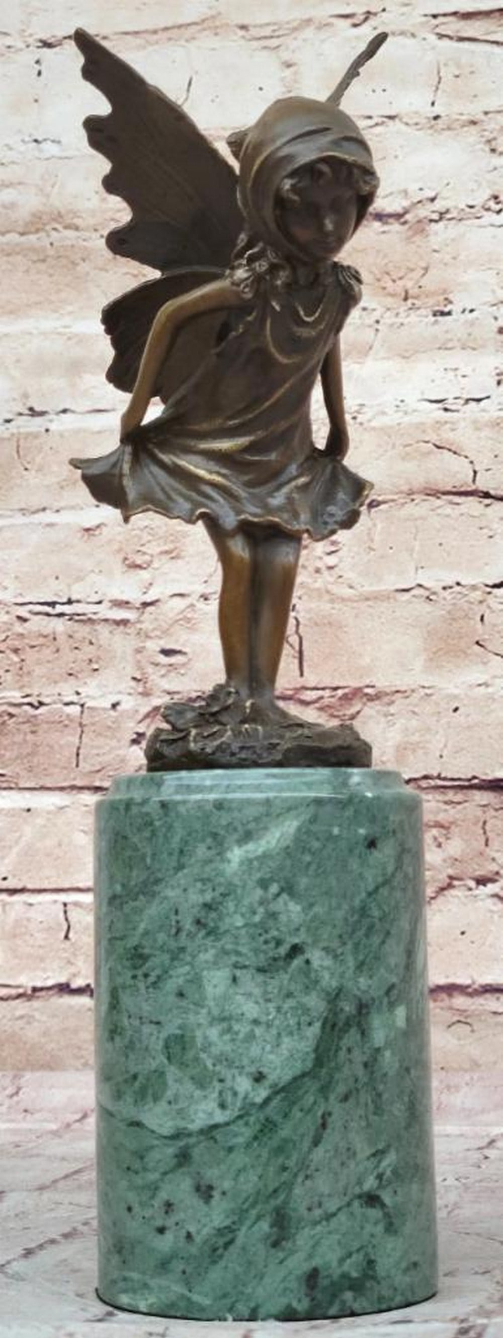 Curtsying Fairy Girl Original Bronze Statue - 12" x 5": Curtsying Fairy Girl Original Bronze Statue - 12" x 5" The bronze statue captures the delicate form of a fairy girl mid-curtsy. Her wings are detailed, complementing her flowing dress and eleg