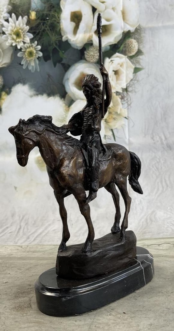 Mohican Warrior on Horseback Bronze Sculpture: Mohican Warrior on Horseback Bronze Sculpture This is a very interesting sculpture of a Native American chief. He sits on his trusted horse and wanders the land, holding a spear and prepared for any p
