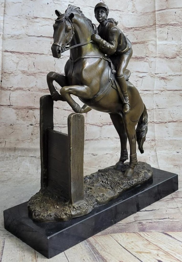 Jockey and Racehorse Bronze Sculpture by Fisher - 13" x 12": Jockey and Racehorse Bronze Sculpture by Fisher - 13" x 12" This finely crafted bronze sculpture by Fisher captures the poise and determination of a jockey atop her racehorse after an exhilara