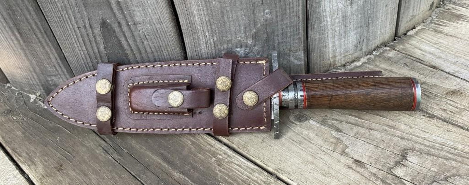 The Northern Boundary Damascus Dagger: Custom Handmade Damascus Steel Dagger Hunting Dagger Knife Handle Walnut Wood with Brass Spacer Damascus Steel Blade with 256 Layers on it. HARDNESS 56-60 H R C VERY HIGH QUALITY GENUINE LEATHER