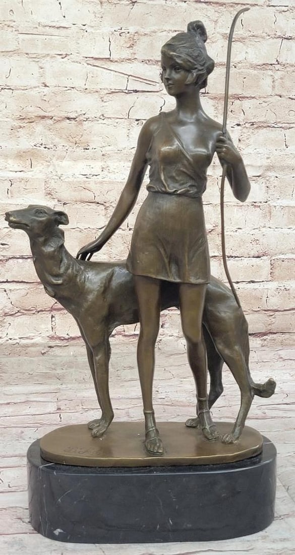 Diana the Huntress Bronze Sculpture after Zach - 17" x 11": Diana the Huntress Bronze Sculpture after Zach - 17" x 11" This bronze sculpture depicts Diana the Huntress, shown standing with a bow and accompanied by a dog. The figure is rendered with att
