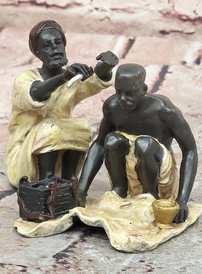 Franz Bergman Cold Painted Bronze Figural Group - 3.5" x 5": Franz Bergman Cold Painted Bronze Figural Group - 3.5" x 5" This bronze sculpture depicts an Arab barber at work, rendered with attention to proportion, detail, and expressive character. The c