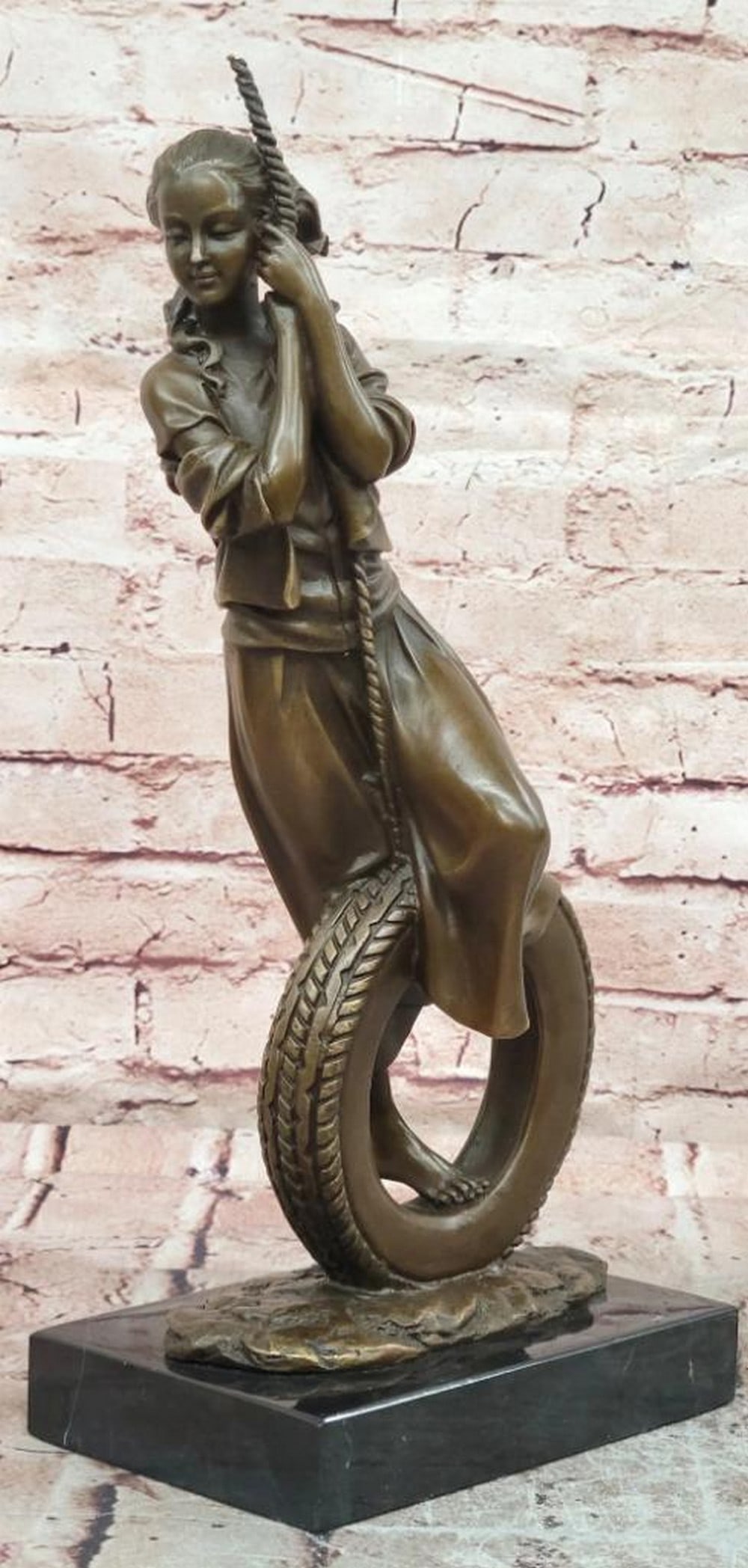 Cesaro 'Young at Heart' Girl Swinging Bronze Sculpture - 14.5" x 7": Cesaro 'Young at Heart' Girl Swinging Bronze Sculpture - 14.5" x 7" This original bronze sculpture by Cesaro captures the carefree joy and innocence of youth. The young girl, gracefully poised