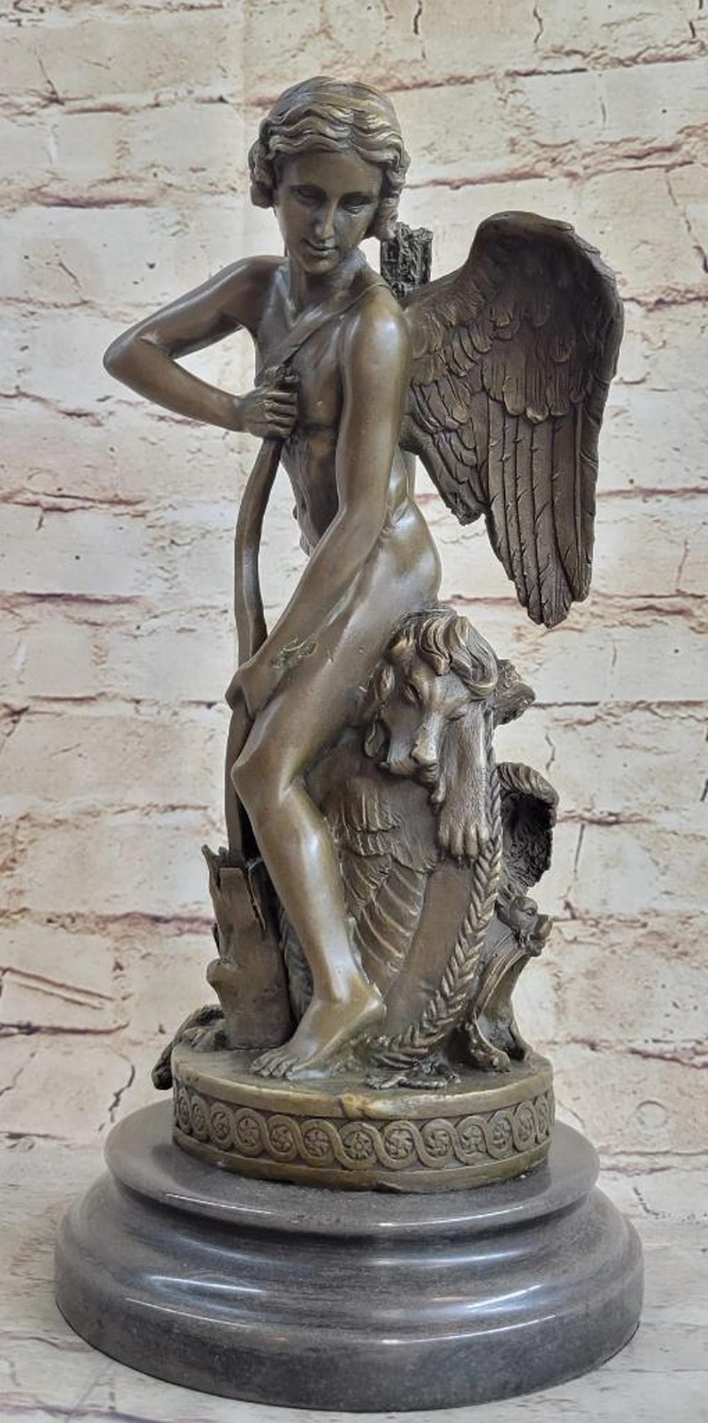 Houdon Inspired Heavenly Angel Bronze Sculpture On Marble Base - 13" x 6.5": Houdon Inspired Heavenly Angel Bronze Sculpture - 13" x 6.5" This is a bronze sculpture of Ipos, one of the many fallen angels, who appears as an angel with a lion`s head. With a bundle of