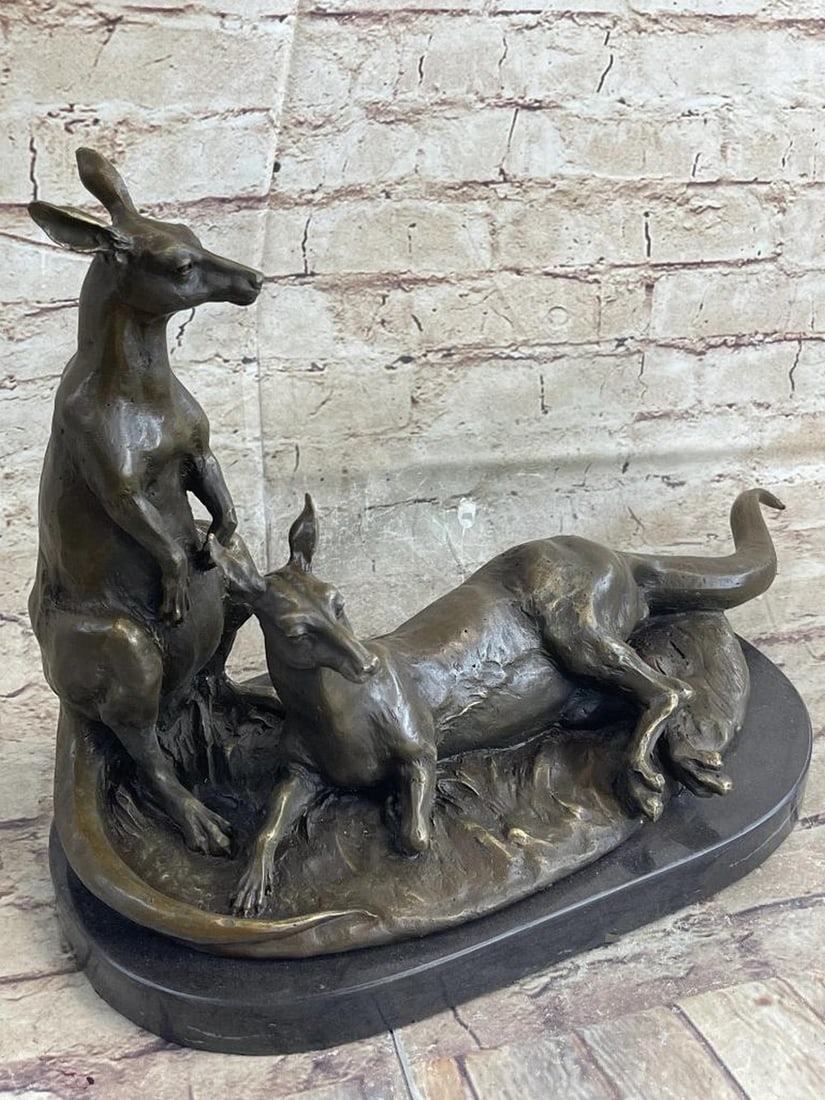 Australian Kangaroos Bronze Sculpture On Marble Base - 12" x 17": Australian Kangaroos Bronze Sculpture On Marble Base - 12" x 17" Lovely contemporary bronze study depicting a laying Kangaroo and another one standing. This sculpture has superb detail and is