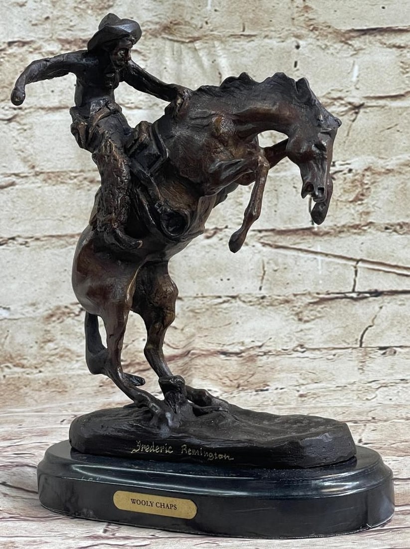 Remington Inspired Wooly Chaps Bronze Sculpture - 10" x 8": Remington Inspired Wooly Chaps Bronze Sculpture - 10" x 8" Wooly Chaps is a masterpiece created by Frederic Remington during his transition to Roman Bronze Works for casting. Embracing the los