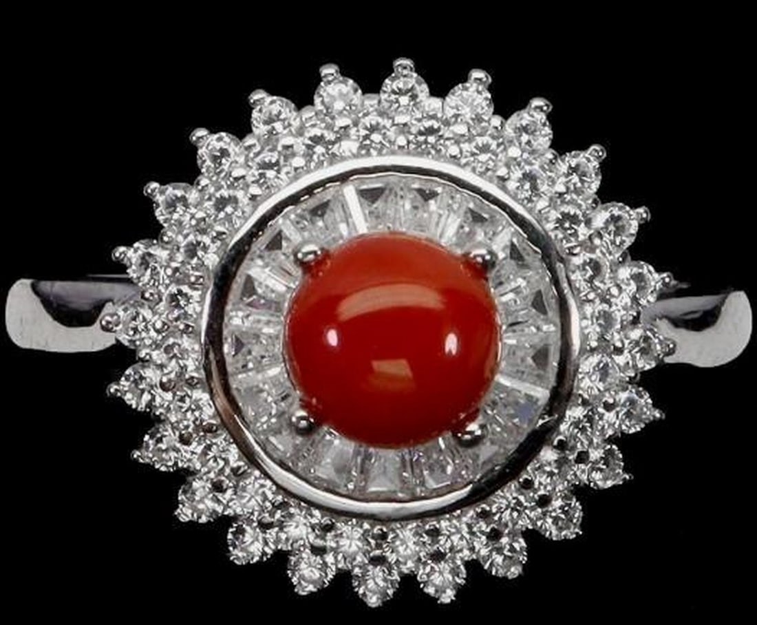 Timeless Round Coral Sterling Silver Ring: Timeless Round Coral Sterling Silver Ring This 925 sterling silver ring features a 6mm round natural coral gemstone from Italy, prized for its warm, vibrant hue and organic beauty. The polished
