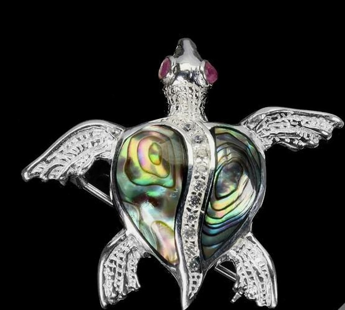 Sterling Silver Ruby & Mother of Pearl Turtle Brooch Pendant: Sterling Silver Ruby & Mother of Pearl Turtle Brooch Pendant This versatile 925 sterling silver design doubles as both a brooch and a pendant, featuring a round ruby from Myanmar set as the