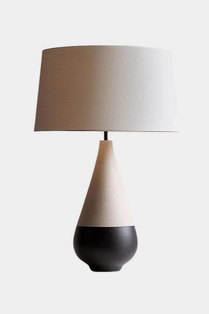 Gradient Cone Wooden Table Lamp: Gradient Cone Wooden Table Lamp Minimalist and sculptural, this handcrafted table lamp features a conical base that transitions from warm wood tones at the top to a sleek matte black finish below.