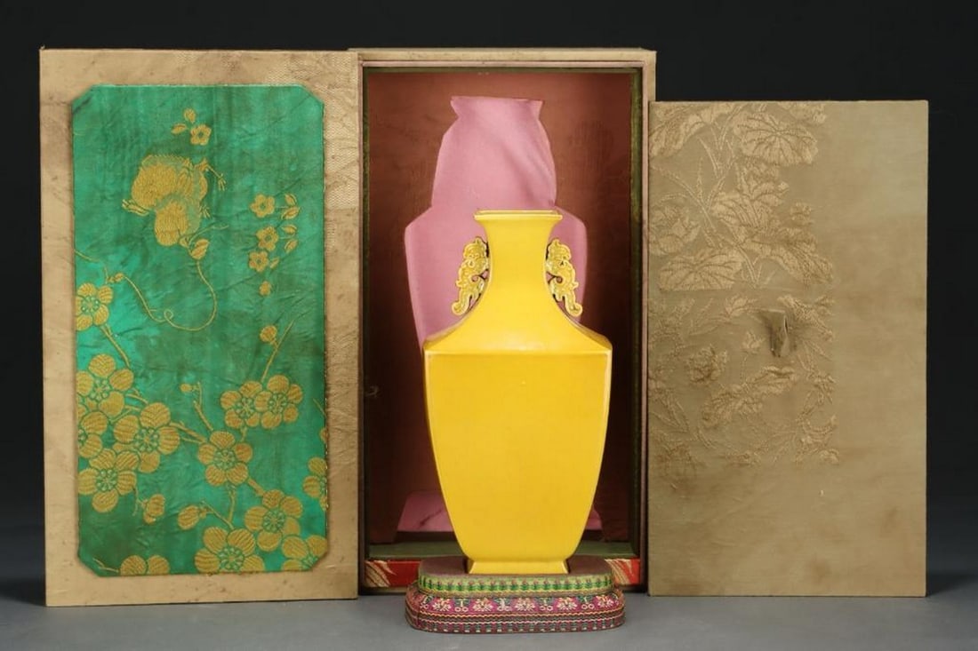 Old Collection Qing Qianlong Yellow-Glazed Amphora: Old Collection Qing Qianlong Yellow-Glazed Amphora An elegant amphora-shaped porcelain vessel from the Qianlong period of the Qing Dynasty, covered in a rich and even yellow glaze. The form is refined