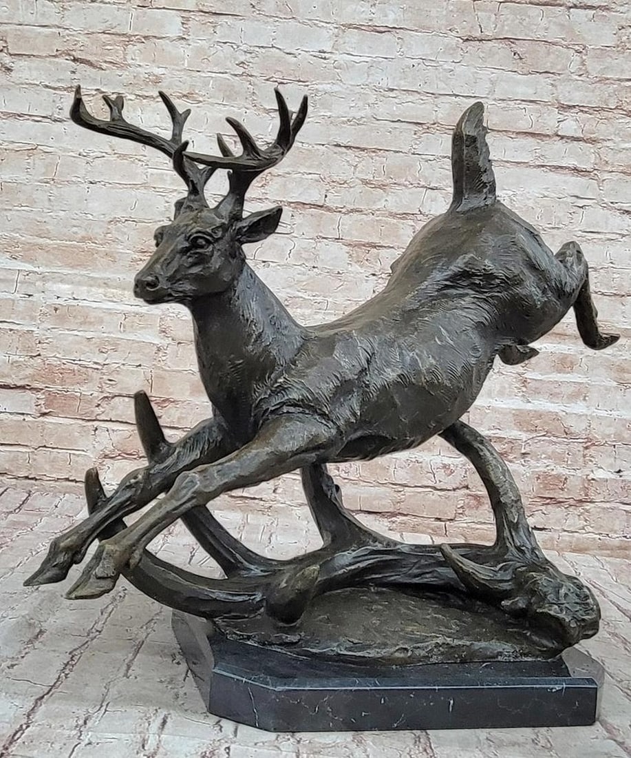 Williams' Original Bronze Stag Sculpture with Marble Base - 19" x 24": Williams' Original Bronze Stag Sculpture with Marble Base - 19" x 24" This original bronze sculpture captures a male deer in mid-stride, showcasing its majestic antlers and lifelike posture. C