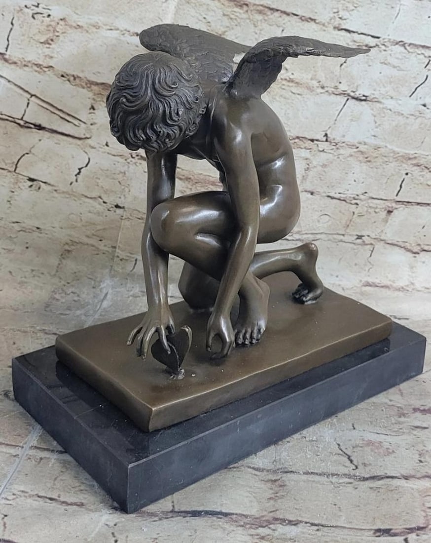 Winged Angel Cherub Cherubim Boy w/ Butterfly Bronze Statue Sculpture Figure 9" x 8.5": A really stunning piece with incredible detail by Michael Angelo makes this a must for serious collectors. Cast in bronze by the traditional hot cast or lost wax method. this is not to be confused wit