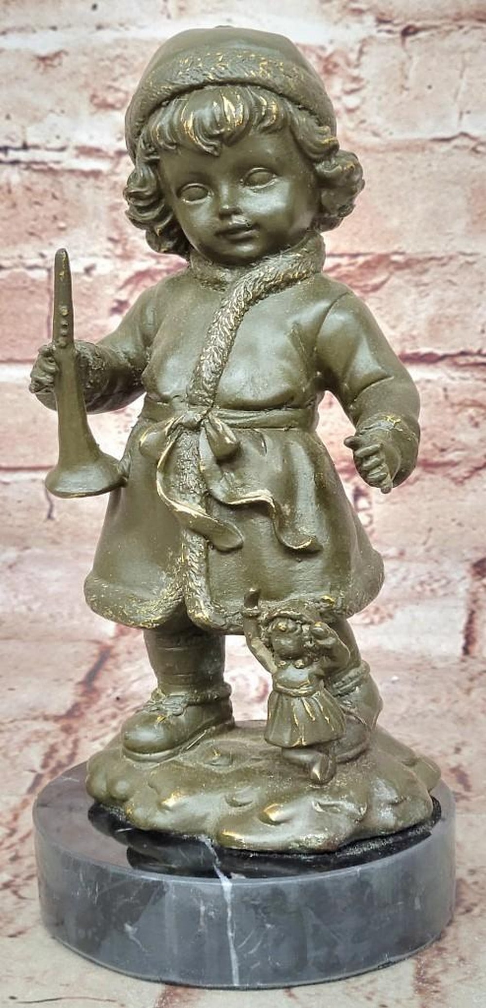 Bronze Winter Child: Melody of the Season: Bronze Winter Child: Melody of the Season A delicate portrayal of winter's enchantment, this bronze sculpture captures a young girl, wrapped in a warm coat and hat, as she stands in the crisp cold wit