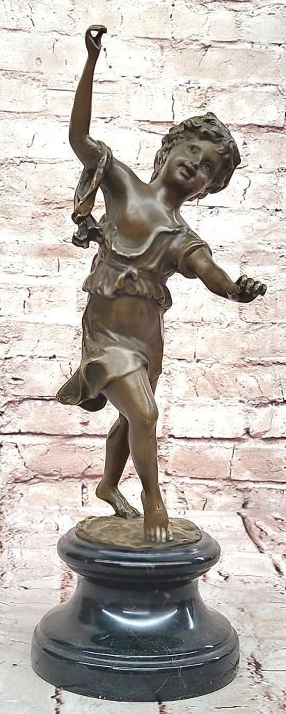 Bronze Dancing Girl: Joyful Childhood: Bronze Dancing Girl: Joyful Childhood This captivating bronze sculpture, a beautiful reproduction bearing the signature of artist Moreau, depicts a young girl caught in a moment of pure joy as she dan