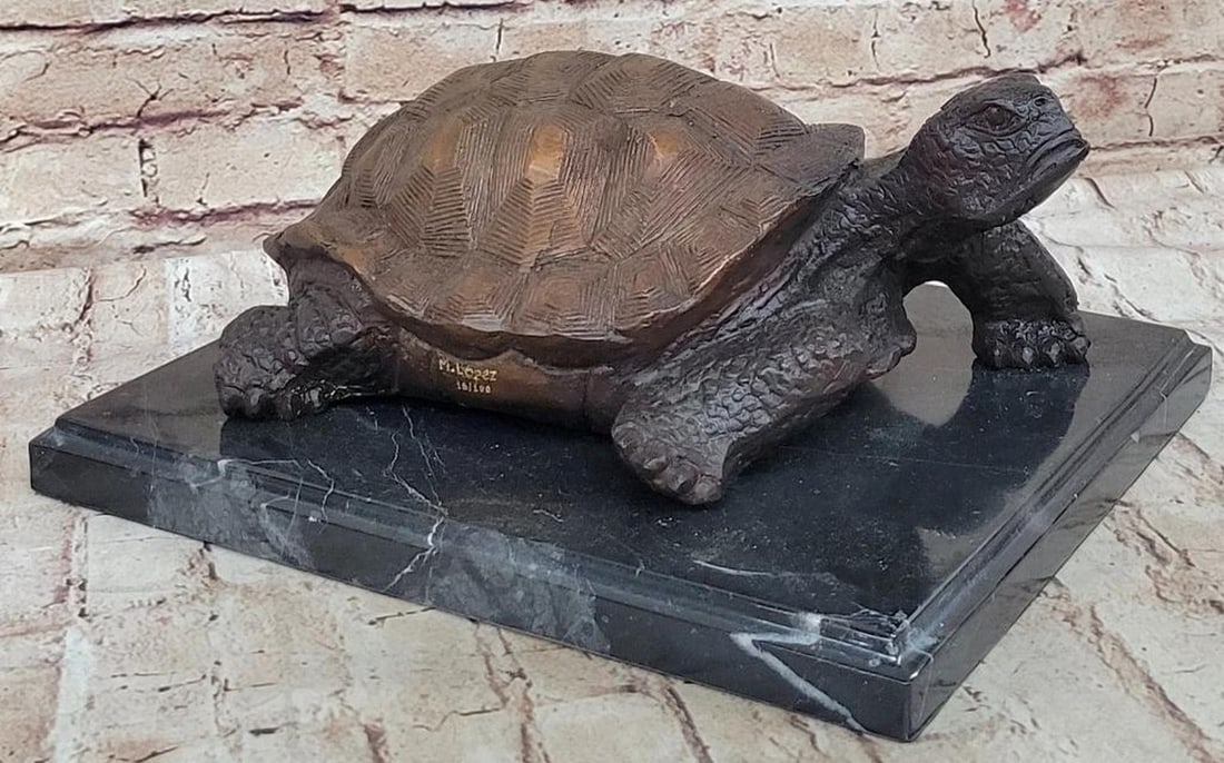 Bronze Tortoise Sculpture On Marble Base - 6" x 12.5": Bronze Tortoise Sculpture On Marble Base - 6" x 12.5" Introducing a magnificent bronze statue brimming with vibrant movement. Behold the joyful journey of a turtle as it gracefully navigates t