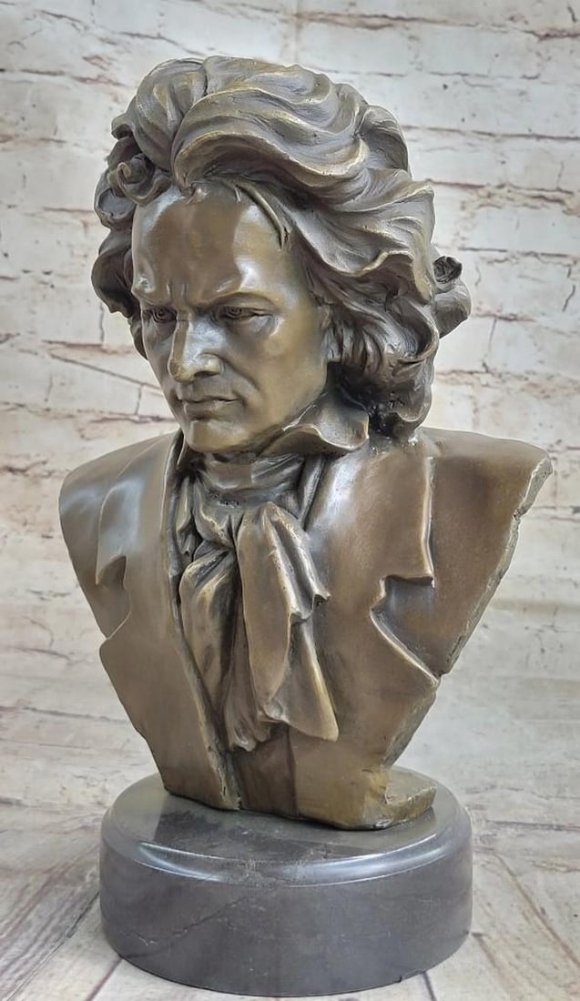 Beethoven Bust Bronze Sculpture: Beethoven Bust Bronze Sculpture This beautiful bust of Beethoven is dressed in his full attire. He looks as if he is perplexed so he steps outside to smoke his pipe. His scroll of music sits next to h