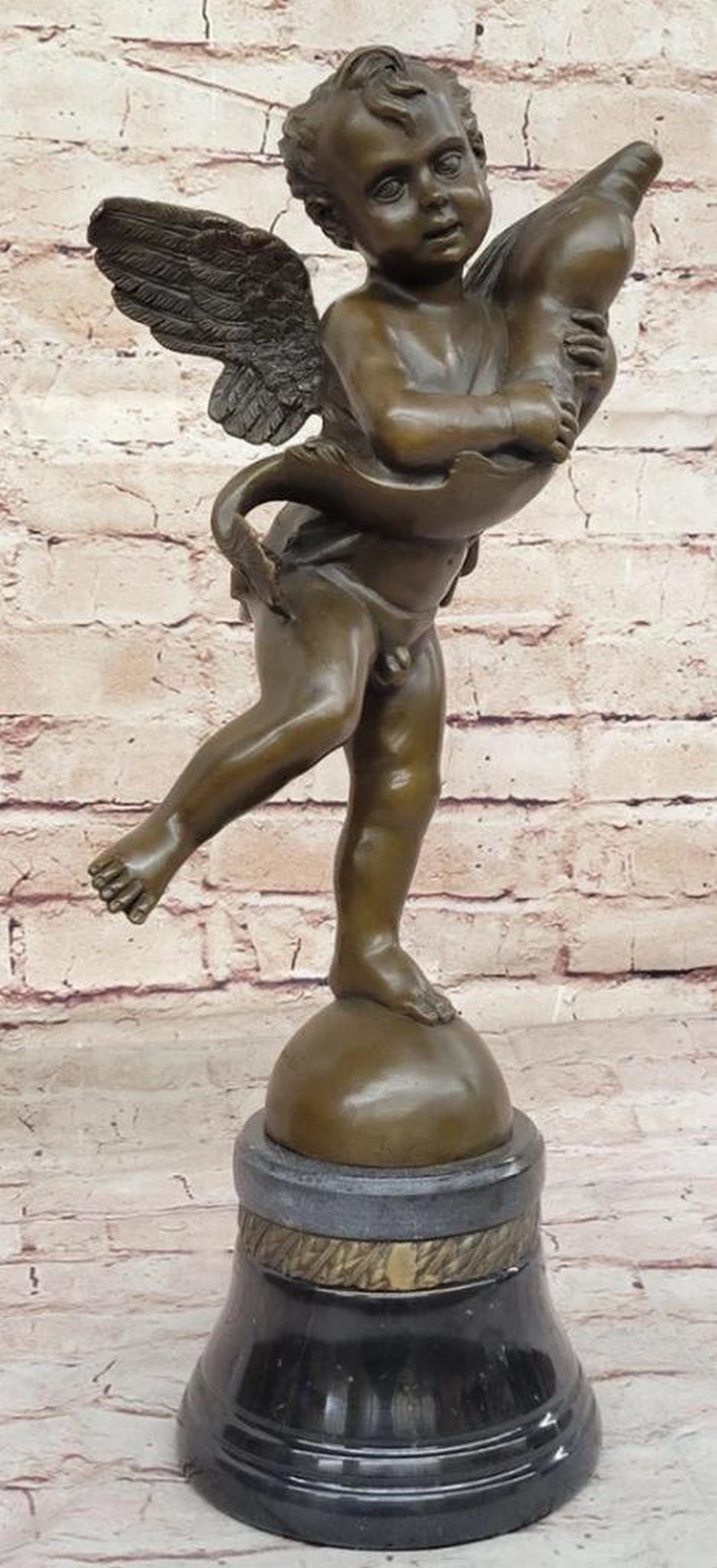 A. del Verrocchio's Original Bronze Sculpture: Cherub Angel Putto with a Dolphin - 16" x 7": A. del Verrocchio's Original Bronze Sculpture: Cherub Angel Putto with a Dolphin - 16" x 7" Andrea del Verrocchio, a prominent sculptor of the Renaissance era, played a crucial role bridging t
