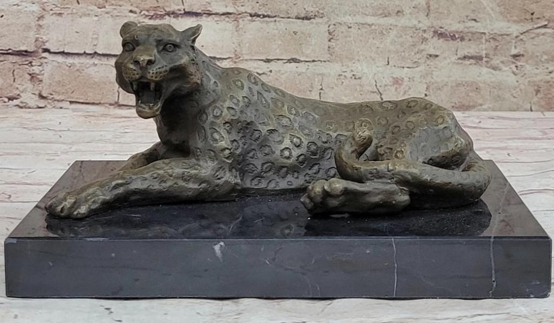 Signed Original Powerful Cheetah Bronze Sculpture On Marble Base - 5" x 10": Signed Original Powerful Cheetah Bronze Sculpture On Marble Base - 5" x 10" Embrace the grace and power of the fastest land animal with this remarkable Bronze Cheetah Sculpture. Designed by th