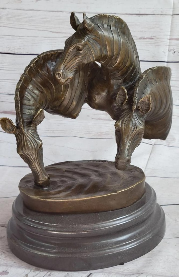 Three Headed Zebra Bust Bronze Sculpture On Marble Base - 12" x 9": Three Headed Zebra Bust Bronze Sculpture On Marble Base - 12" x 9" Looking for a stunning piece of art that will add elegance and beauty to your spaceL Look no further than this exquisite bron
