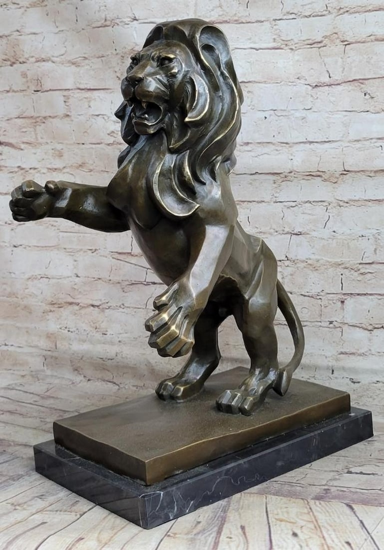 Abstract Majestic Lion Bronze Sculpture Inspired by H. Moore - 19" x 12": Abstract Majestic Lion Bronze Sculpture Inspired by H. Moore - 19" x 12" Experience the abstract interpretation of the king of the jungle with this meticulously crafted bronze sculpture. This 