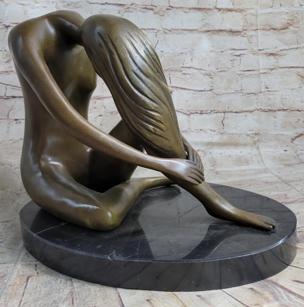 Bowing Nude Woman Bronze Sculpture: Bowing Nude Woman Bronze Sculpture Sitting provocatively yet elegantly, a confident young woman reveals her long curvy legs and fully nude to stir envy amongst other women and to provoke lust amongst 