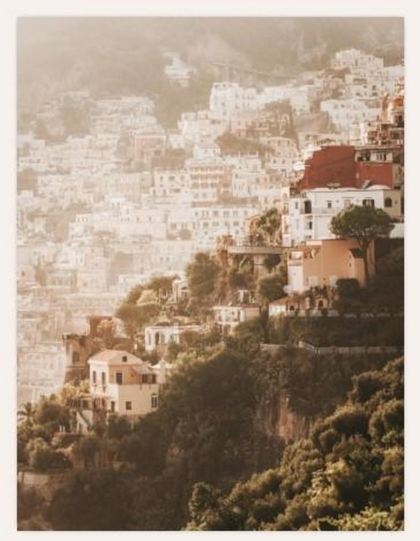 Amalfi Horizon Poster: Amalfi Horizon Poster A scenic poster depicting the Amalfi Coast with white hillside buildings surrounded by lush greenery. The design captures the charm of coastal living and adds a touch of