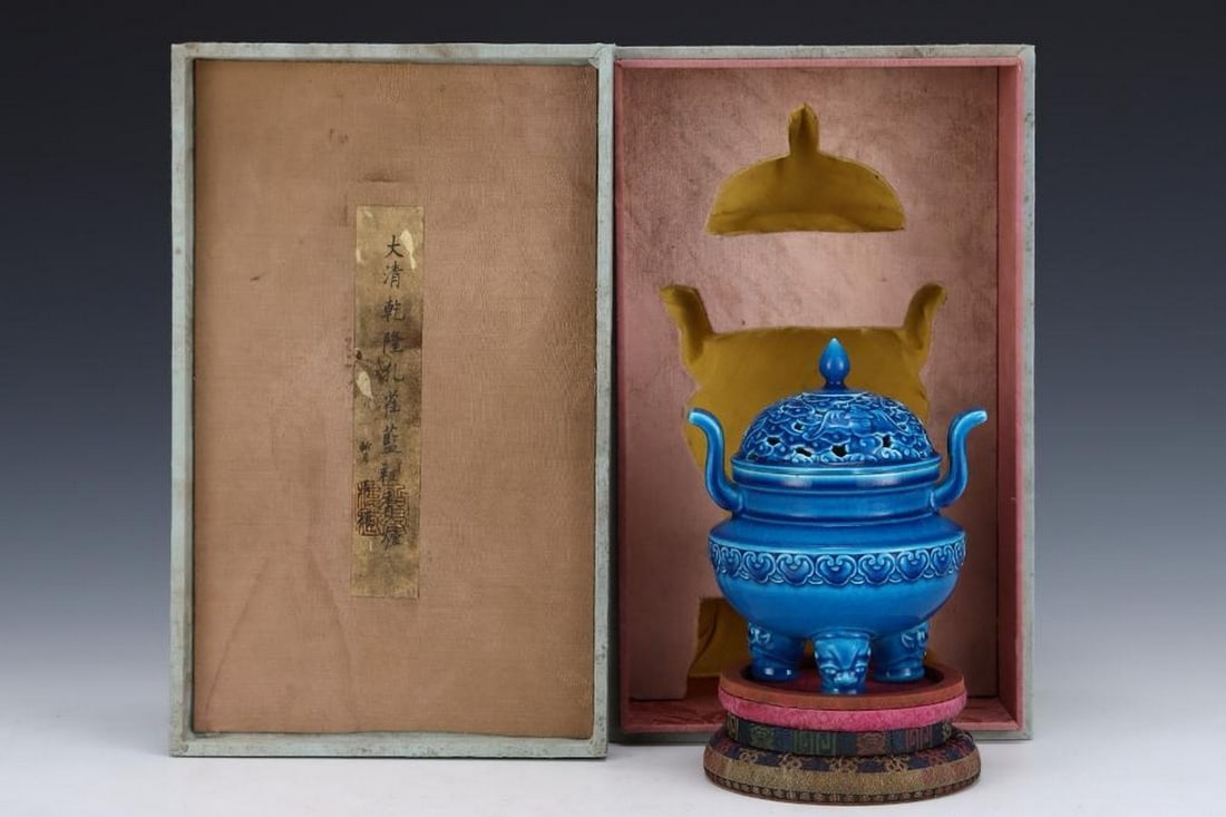 Qing Qianlong Peacock Blue Glaze Burner: Qing Qianlong Peacock Blue Glaze Burner A finely crafted burner from the Qianlong period of the Qing Dynasty, featuring a lustrous peacock blue glaze. The piece exemplifies the refined artistry and te