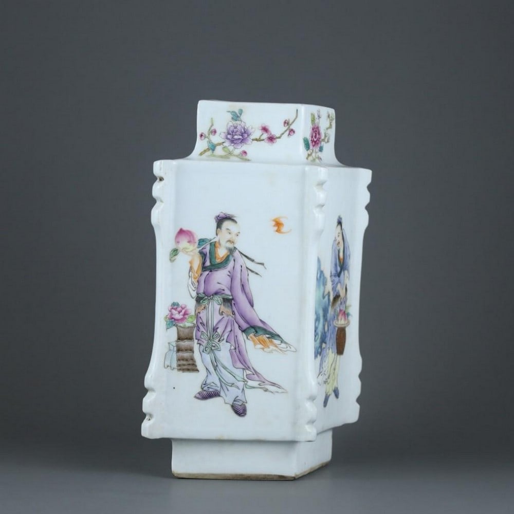 Qing Dynasty Yongzheng Famille Rose Figure Diamond-Shaped Vase: Qing Dynasty Yongzheng Famille Rose Figure Diamond-Shaped Vase A finely crafted diamond-shaped porcelain vase from the Yongzheng period of the Qing Dynasty, beautifully decorated in the vibrant famill